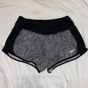 black and white patterned Nike shorts